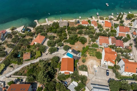 Property building, Day, Neighbourhood, Natural landscape, Bird's eye view, Beach, City view, Sea view, Street view