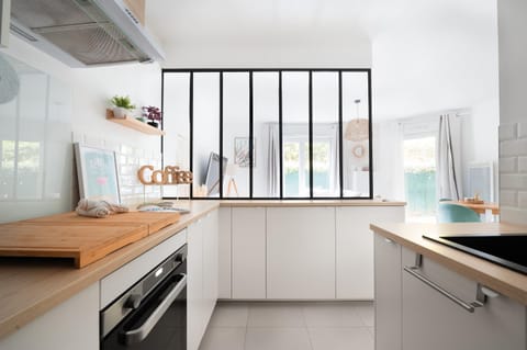 Kitchen or kitchenette, dishwasher, oven, stove