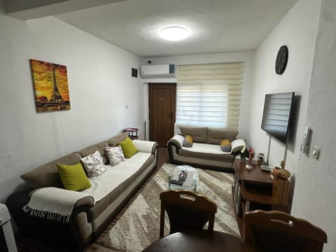 TV and multimedia, Living room, Seating area, furniture, heating, air conditioner