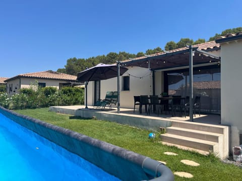 Property building, Patio, Day, Garden, Garden view, Pool view, Swimming pool, sunbed