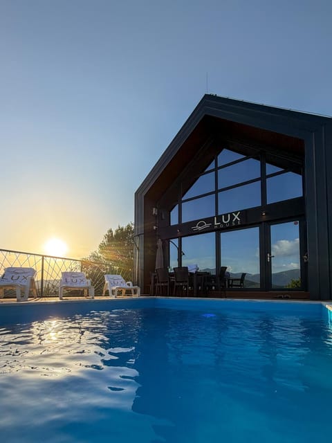 Property building, Swimming pool, Sunset, sunbed