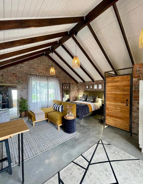 Bed, Living room, Seating area, Bedroom
