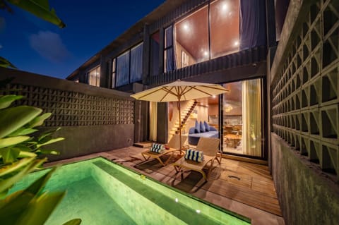 Property building, Night, Seating area, Swimming pool, sunbed