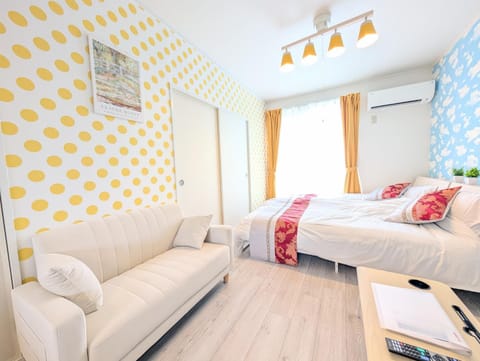 Bed, Living room, Seating area, Bedroom, air conditioner