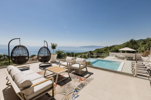 Patio, View (from property/room), Balcony/Terrace, Lounge or bar, Seating area, Sea view, Swimming pool, sunbed