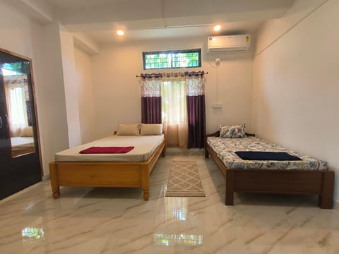Bed, Photo of the whole room, Bedroom, towels, air conditioner
