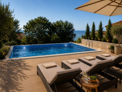 Patio, Natural landscape, Pool view, Sea view, Swimming pool, sunbed