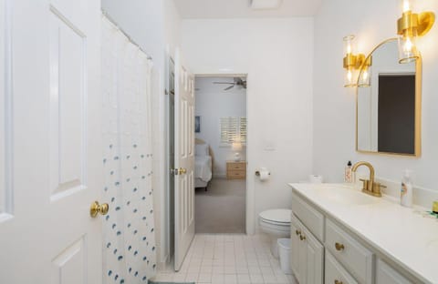 Toilet, Bed, Bathroom, Bedroom, Bath, hair dryier, towels