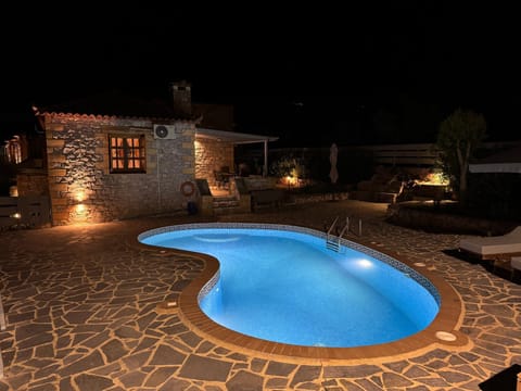 Property building, Night, Natural landscape, Pool view, Swimming pool, sunbed