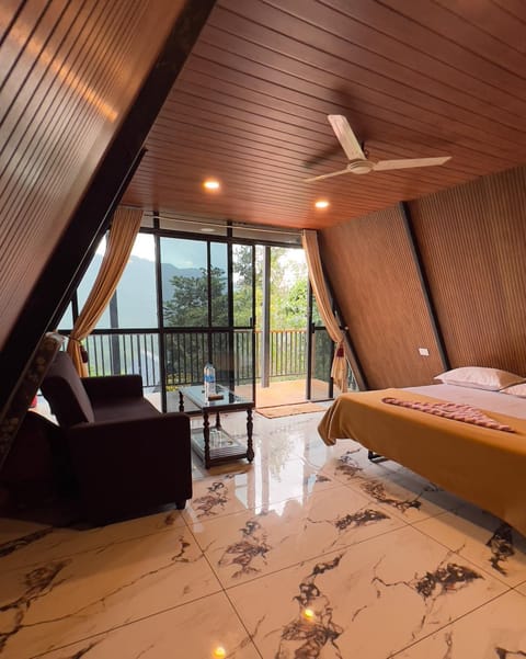 Bed, Seating area, Bedroom