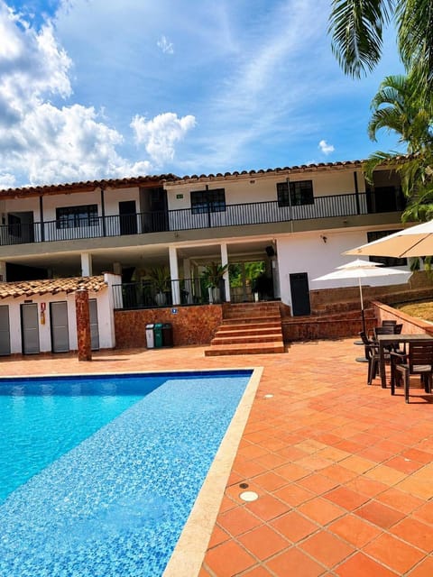 Property building, Patio, Day, View (from property/room), Balcony/Terrace, Pool view