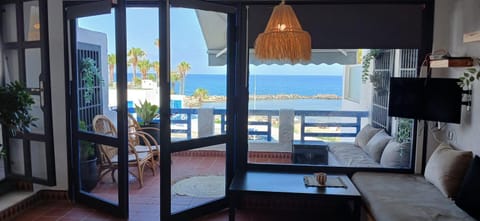 Communal lounge/ TV room, Bed, Natural landscape, TV and multimedia, View (from property/room), Balcony/Terrace, Living room, Dining area, Evening entertainment, Bedroom, Sea view