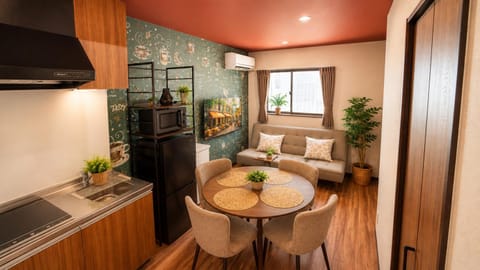 Kitchen or kitchenette, Dining area, stove, air conditioner