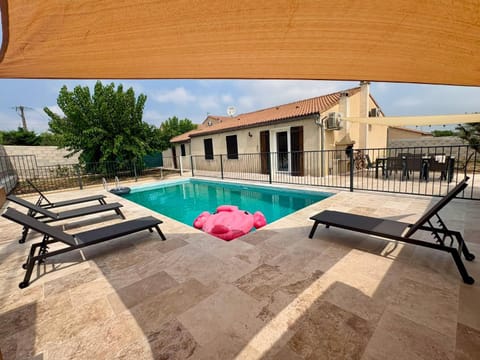 Property building, Patio, Swimming pool, sunbed