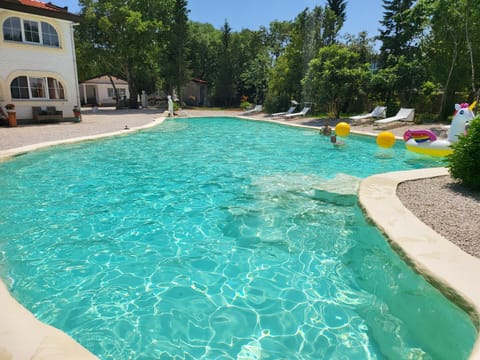 Property building, Garden, Pool view, Swimming pool, sunbed