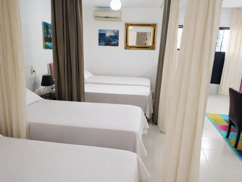 Bed, Living room, Seating area, Bedroom, air conditioner