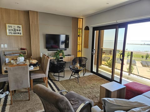 Communal lounge/ TV room, Natural landscape, TV and multimedia, View (from property/room), Living room, Dining area