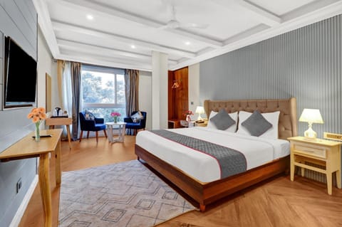 Communal lounge/ TV room, Bed, TV and multimedia, Living room, Photo of the whole room, Seating area, Evening entertainment, Bedroom, hair dresser