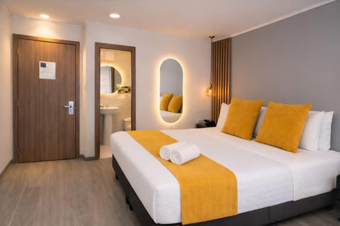 Bed, Bathroom, Photo of the whole room, Decorative detail, Seating area, Bedroom, towels, wardrobe