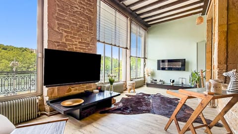 Communal lounge/ TV room, Natural landscape, TV and multimedia, View (from property/room), Living room, Seating area, Dining area