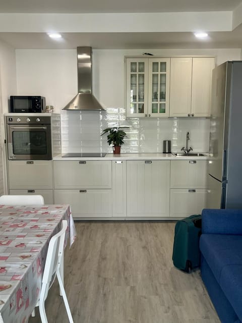 Kitchen or kitchenette, oven, stove