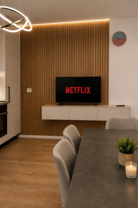 TV and multimedia, Living room, Seating area, Text overlay