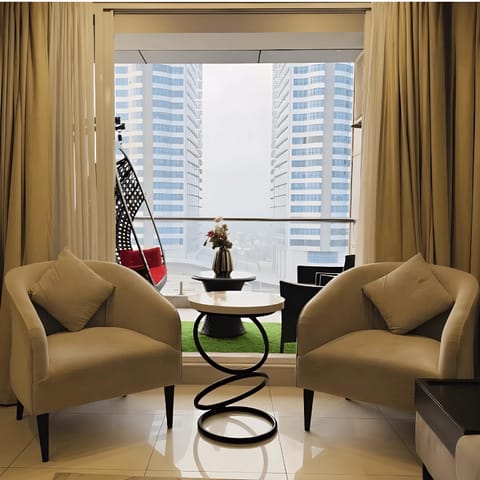 View (from property/room), Living room, Seating area, City view