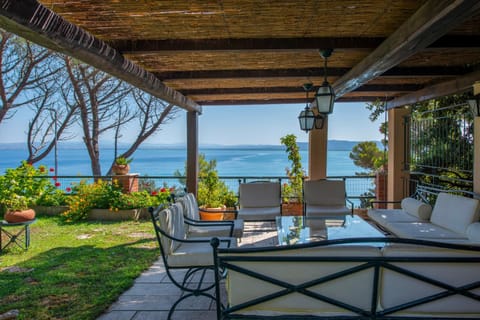 Patio, Spring, Day, Natural landscape, Garden, View (from property/room), Balcony/Terrace, Living room, Seating area, Dining area, Garden view, Sea view