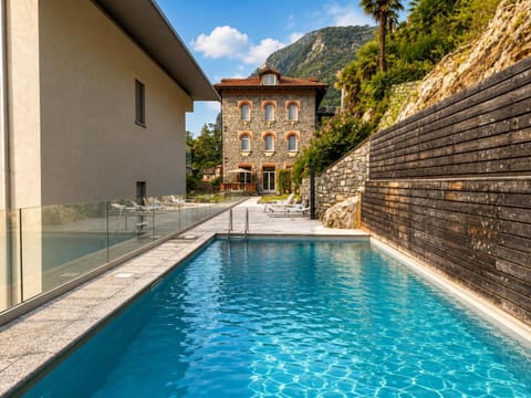 Property building, Day, Natural landscape, Mountain view, Pool view, Swimming pool, sunbed