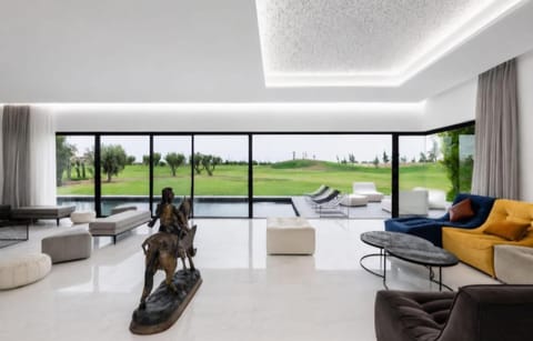 Patio, Living room, Seating area, Pool view, Swimming pool