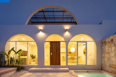 Property building, Patio, Night, Pool view, Swimming pool