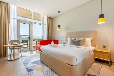 Bed, Living room, Seating area, Bedroom