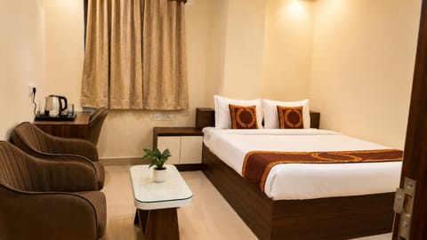 Bed, Living room, Seating area, Bedroom