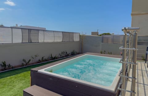 Property building, Living room, Swimming pool