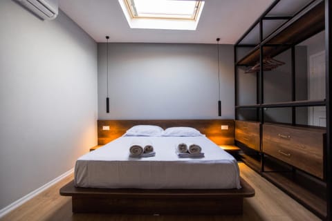Bed, Photo of the whole room, Bedroom, towels, air conditioner