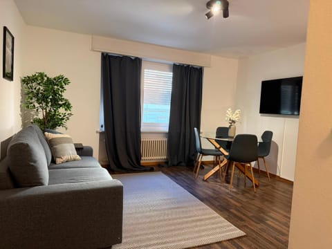 TV and multimedia, Living room, Photo of the whole room, Seating area, Dining area