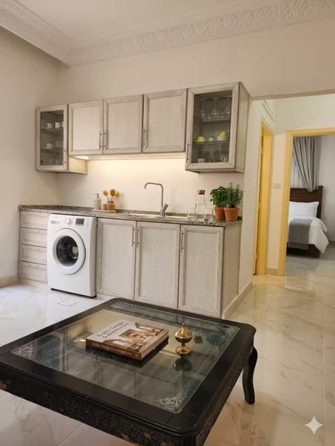 Kitchen or kitchenette, oven, stove, washing machine