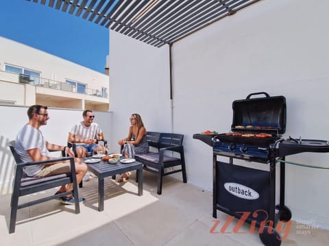 Patio, Day, People, BBQ facilities, BBQ facilities, Seating area, group of guests