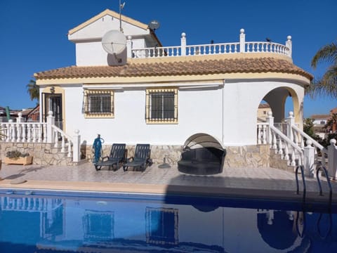 Property building, Living room, Swimming pool