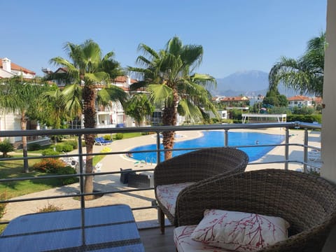 Property building, Patio, Spring, Day, Natural landscape, View (from property/room), Balcony/Terrace, Pool view, Pool view, Swimming pool, Swimming pool, Swimming pool, sunbed