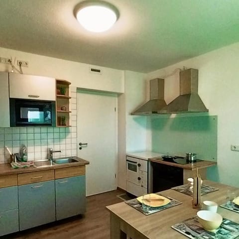 Dining area, dishwasher, oven, stove, toaster