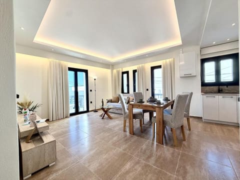 Kitchen or kitchenette, Living room, Seating area, Dining area