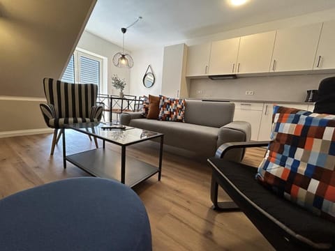 Kitchen or kitchenette, Living room, Seating area, Dining area