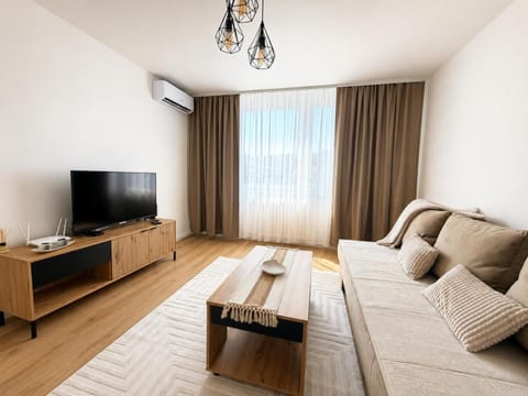 Bed, TV and multimedia, Living room, Photo of the whole room, Seating area, Bedroom