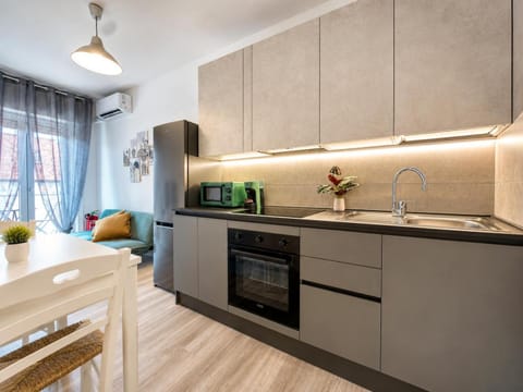 Kitchen or kitchenette, oven, stove