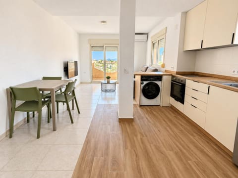 Kitchen or kitchenette, Living room, Dining area, stove, washing machine