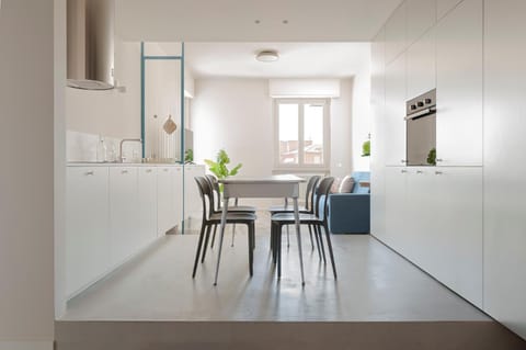Kitchen or kitchenette, Living room, Seating area, Dining area, stove, air conditioner