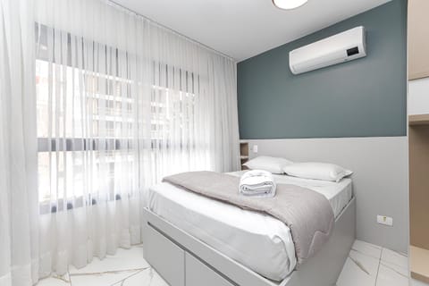 Bed, Photo of the whole room, Bedroom, towels, air conditioner