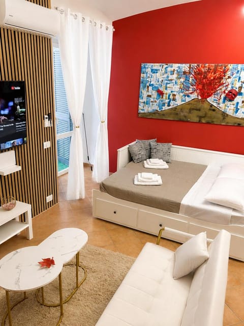 Bed, Living room, Seating area