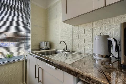 Kitchen or kitchenette, toaster